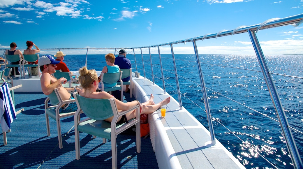 Fiji showing boating as well as a small group of people