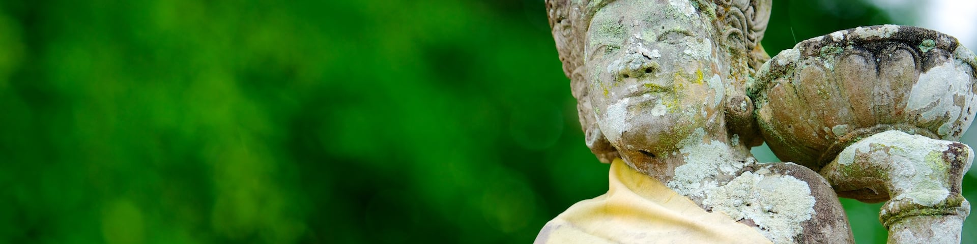 Mayura Park featuring outdoor art and a statue or sculpture