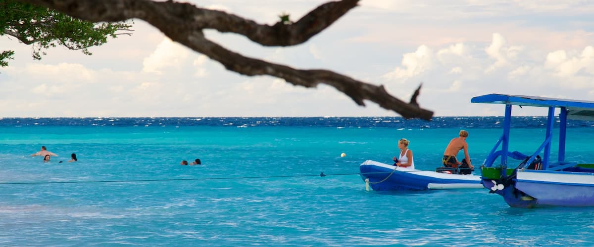 Gili Islands which includes boating, swimming and general coastal views