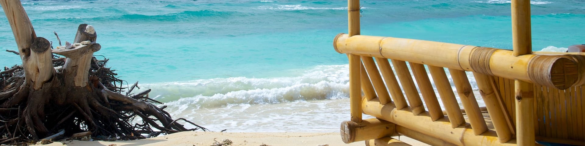 Gili Islands featuring a sandy beach and tropical scenes