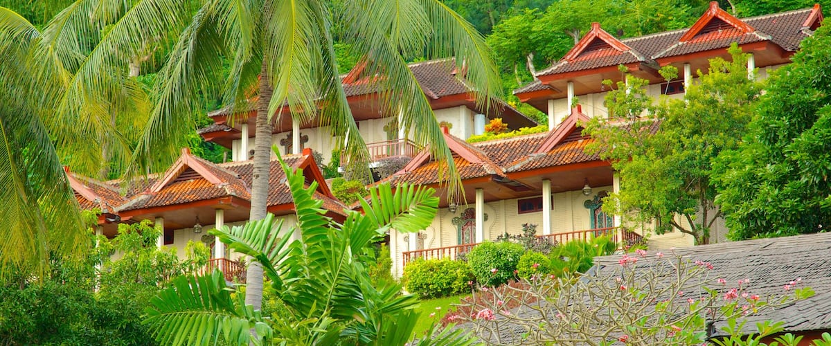 Senggigi que incluye una casa, escenas tropicales y patrimonio de arquitectura