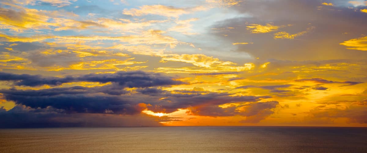 Senggigi featuring a sunset and landscape views