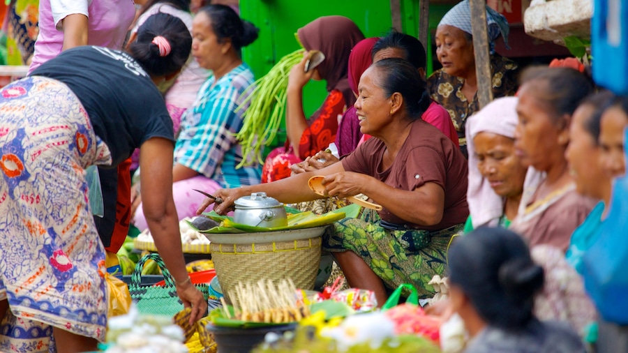 Tanjung which includes markets as well as a large group of people