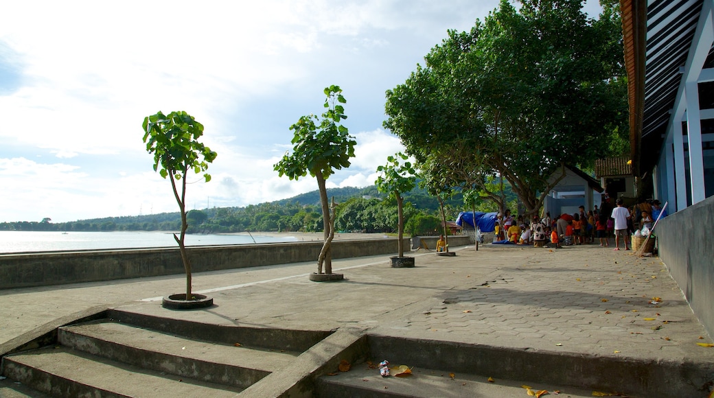 Lombok featuring a temple or place of worship and general coastal views