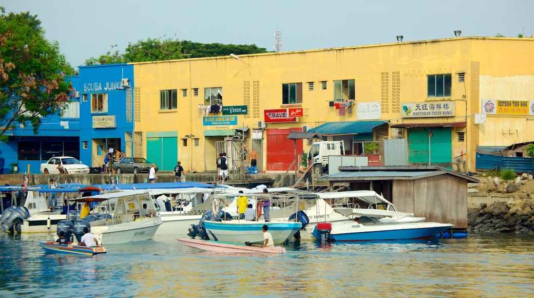 Tun Sakaran Marine Park showing boating and a coastal town