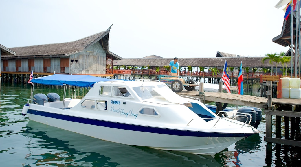 Tun Sakaran Marine Park showing boating and a coastal town