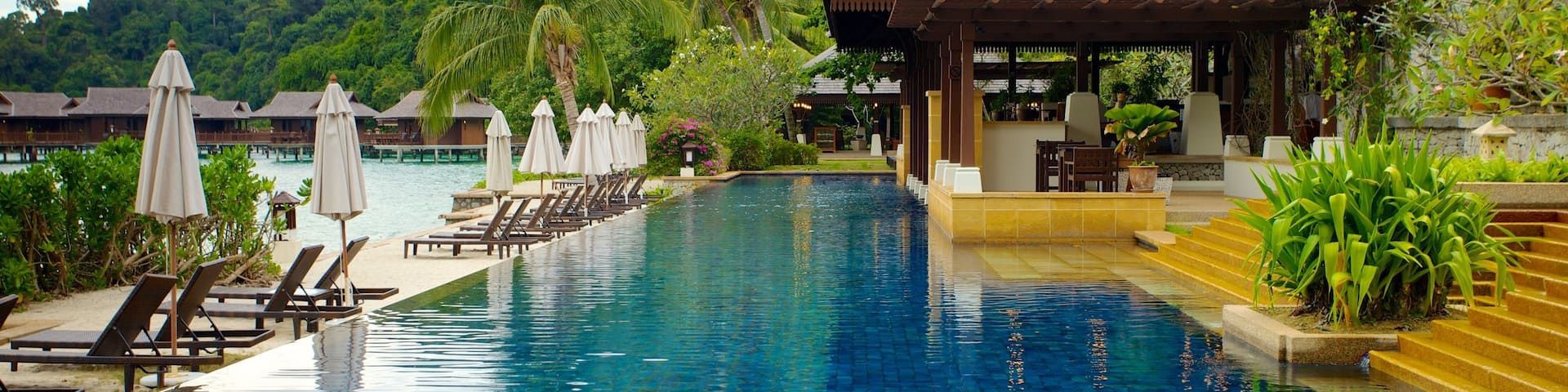 Pangkor Laut which includes a pool and a luxury hotel or resort