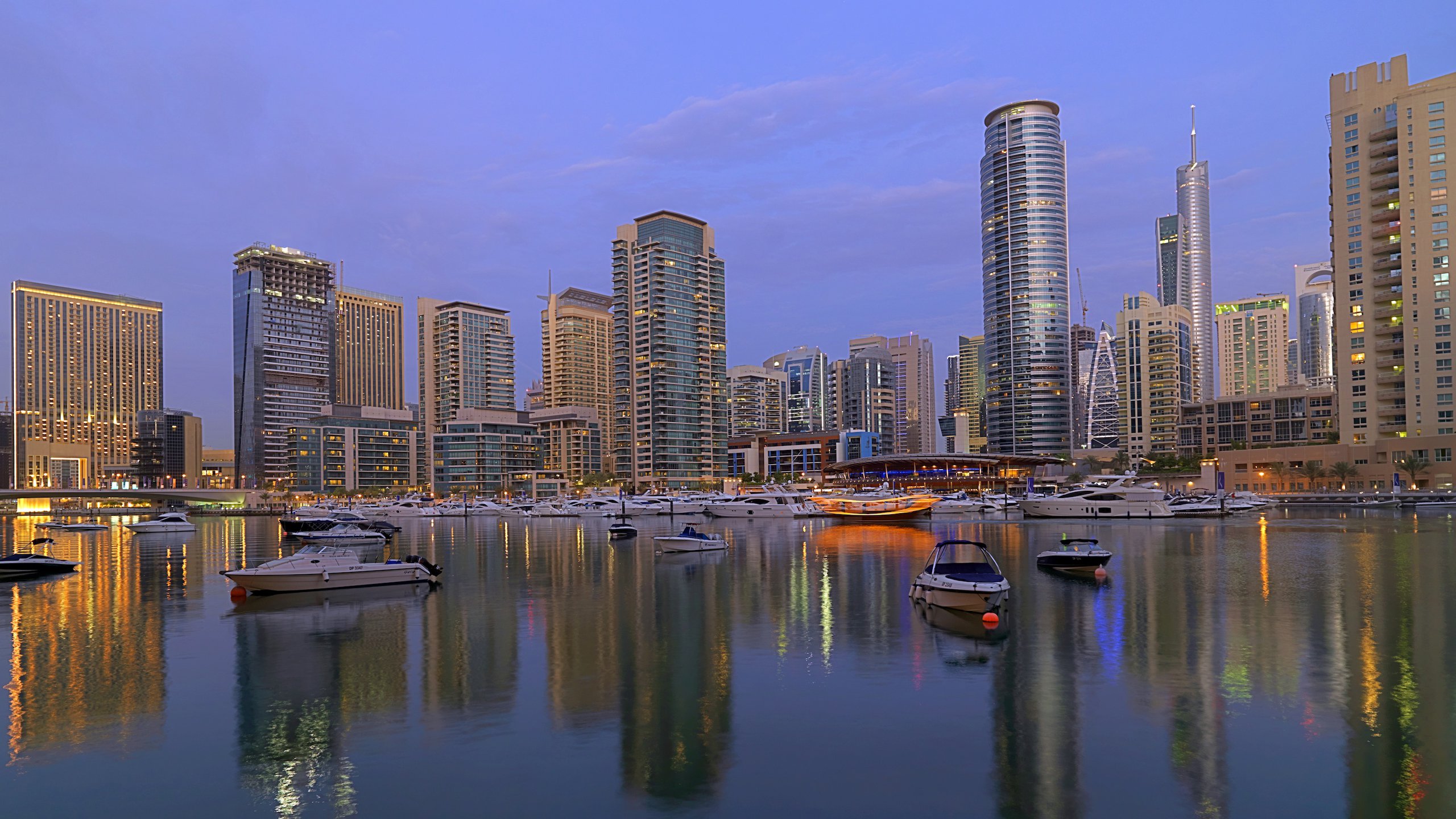 Dubai Marina which includes a city, a marina and boating