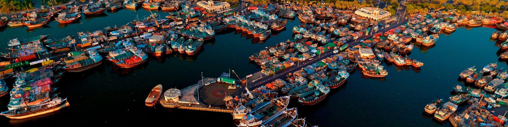 Dubai Creek showing boating, a city and cbd