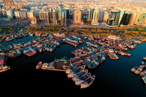Dubai Creek showing boating, a city and cbd