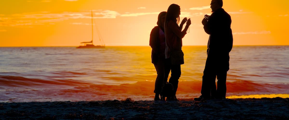 Glenelg Beach showing a pebble beach, landscape views and a sunset