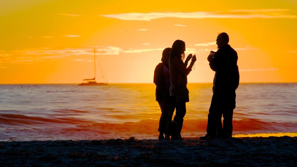 Glenelg Beach featuring landscape views, a sunset and a pebble beach