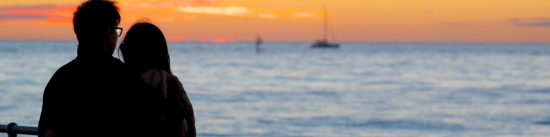 Glenelg Beach showing a sunset, general coastal views and views