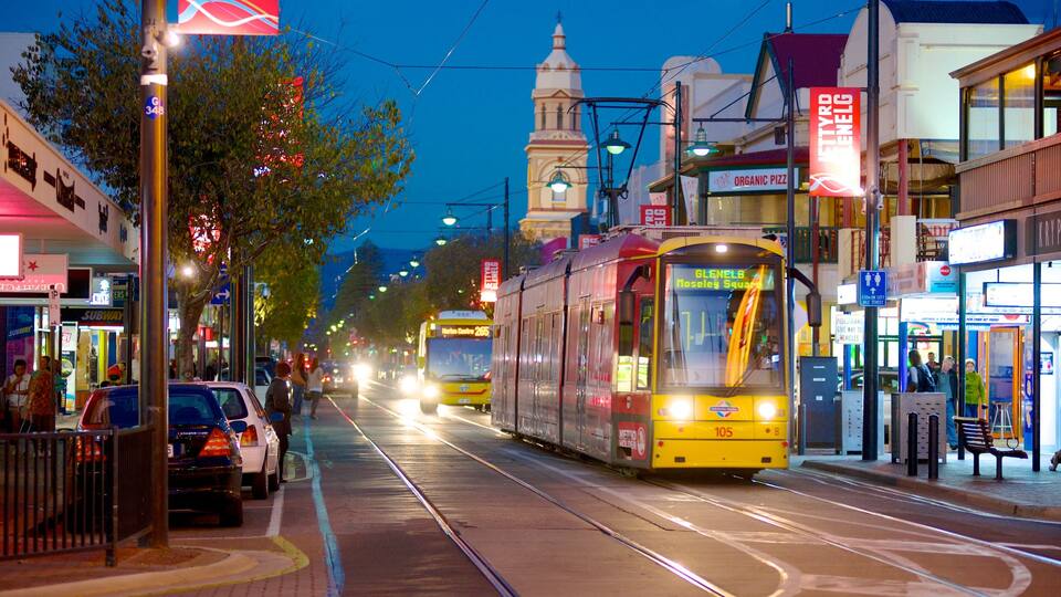 Glenelg Beach which includes night scenes, a city and street scenes