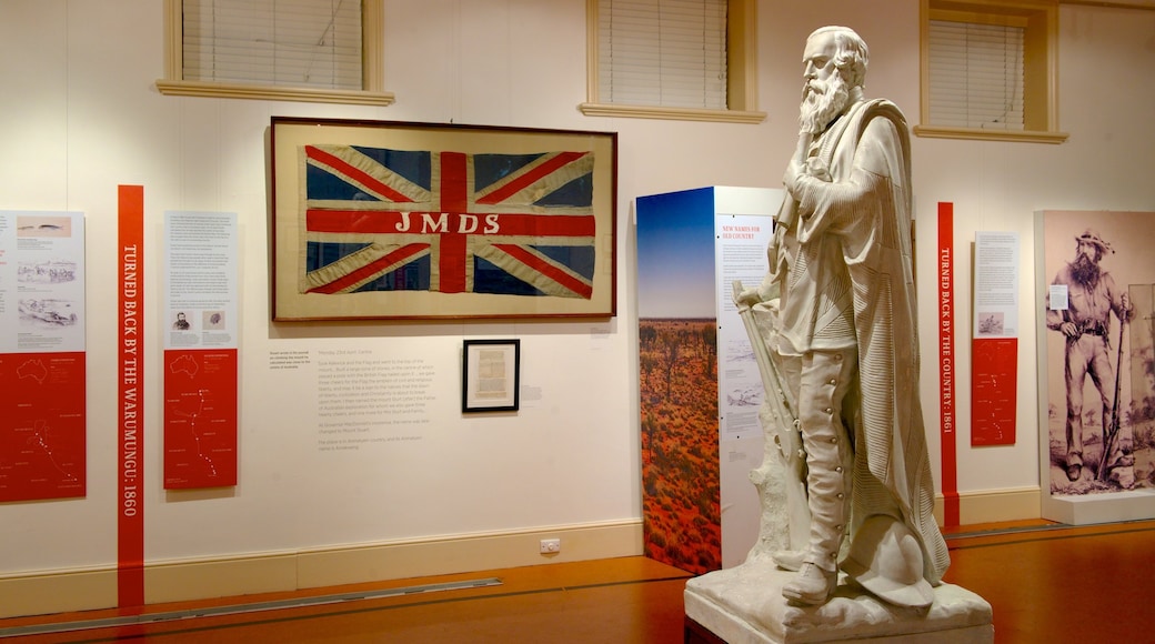 Migration Museum showing a statue or sculpture and interior views