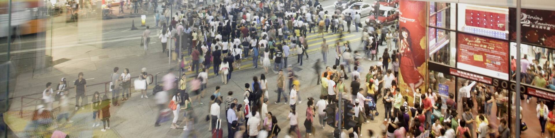 Causeway Bay Typhoon Shelter showing a city and street scenes as well as a large group of people