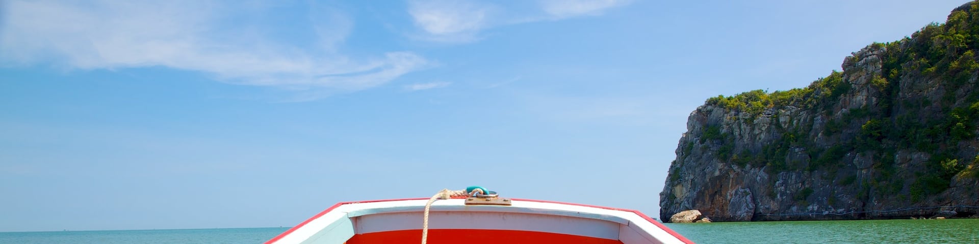 Hua Hin which includes rocky coastline and boating