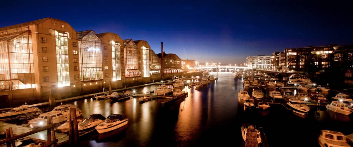 Trondheim which includes central business district, a coastal town and a bay or harbor