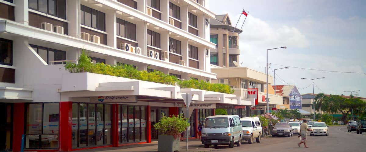 Apia featuring a city and street scenes as well as an individual male