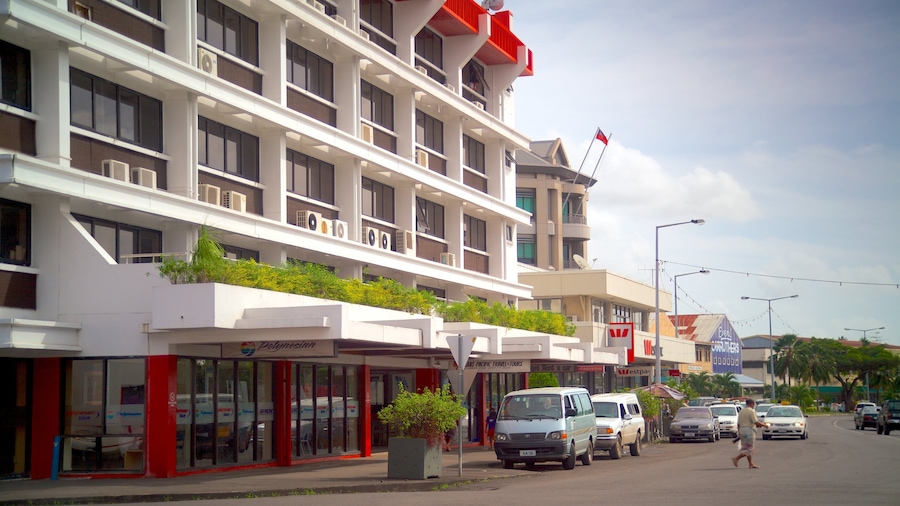 Apia which includes a city and street scenes as well as an individual male