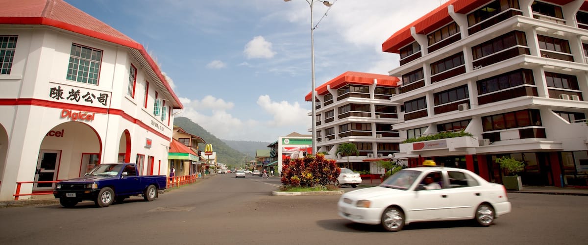 Apia que incluye señalización, una ciudad y escenas urbanas