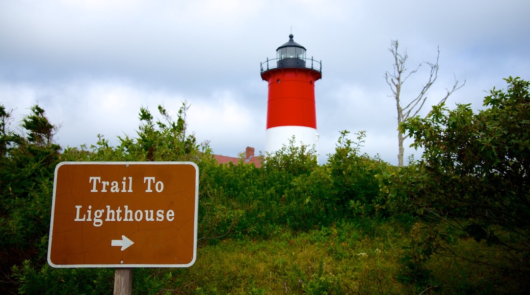 Nauset Light Beach featuring a lighthouse and signage