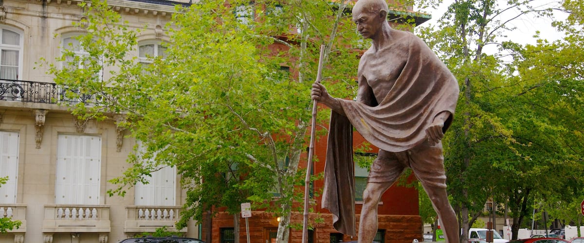 Dupont Circle which includes a monument and a statue or sculpture