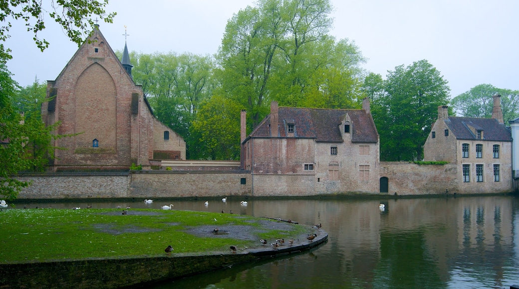 Minnewater showing a park, a church or cathedral and heritage architecture