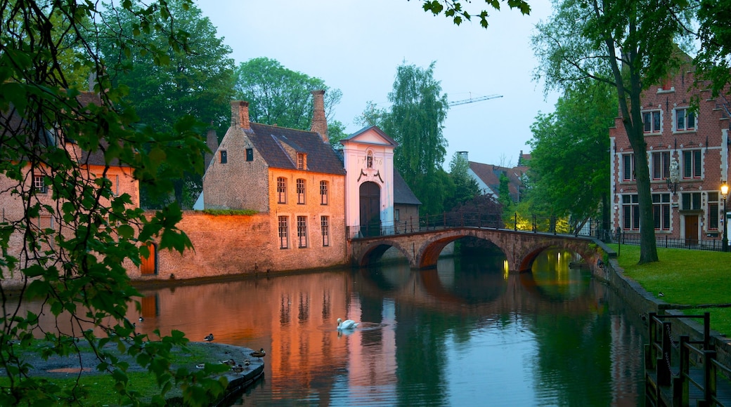 Begijnhof showing a small town or village, a river or creek and a bridge