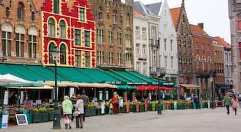 Bruges Market Square showing markets, heritage architecture and street scenes