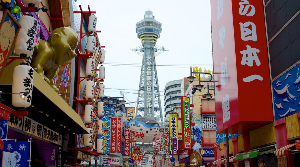 Tsutenkaku Tower showing street scenes, a city and signage