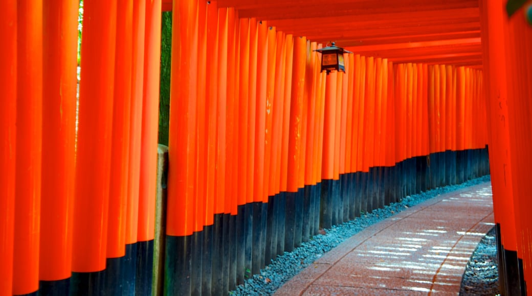 Fushimi Inari Shrine featuring interior views and a temple or place of worship