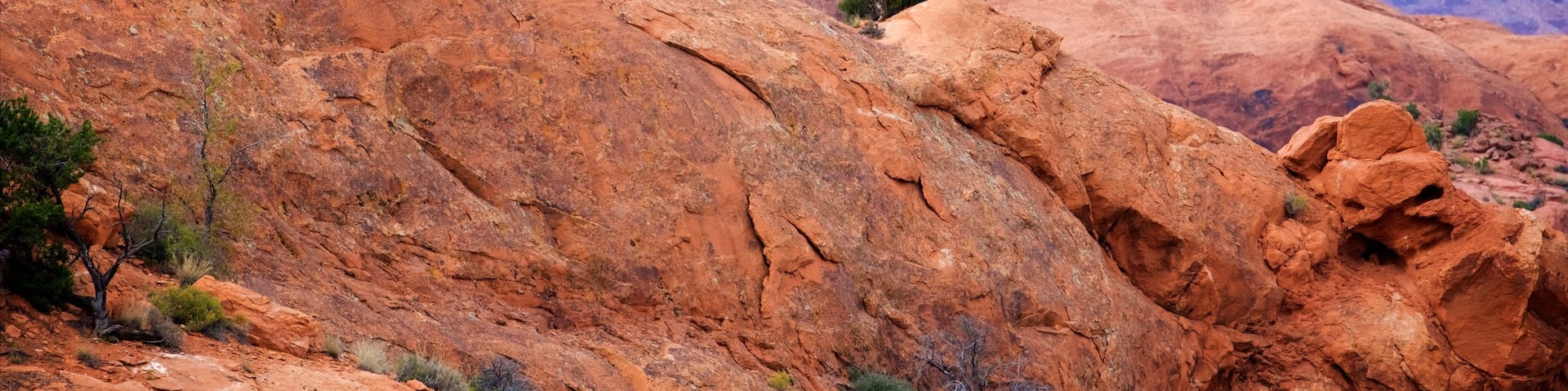 Upheaval Dome showing a gorge or canyon, hiking or walking and landscape views