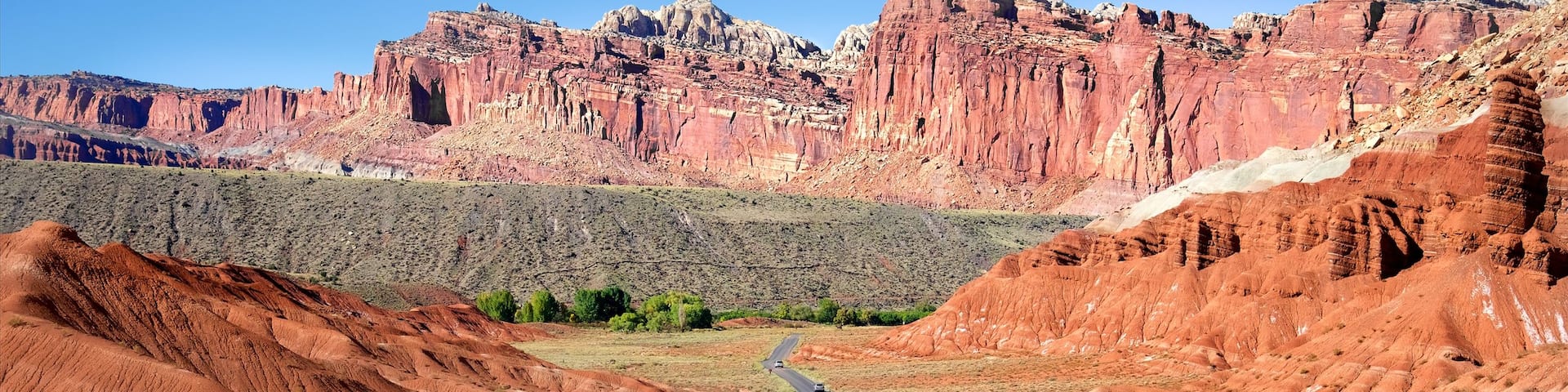 Rim Road Scenic Drive showing desert views, landscape views and a gorge or canyon