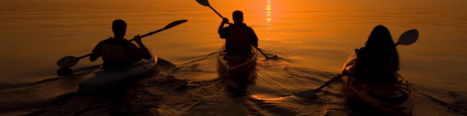 Lake Ouachita State Park featuring kayaking or canoeing, a sunset and general coastal views