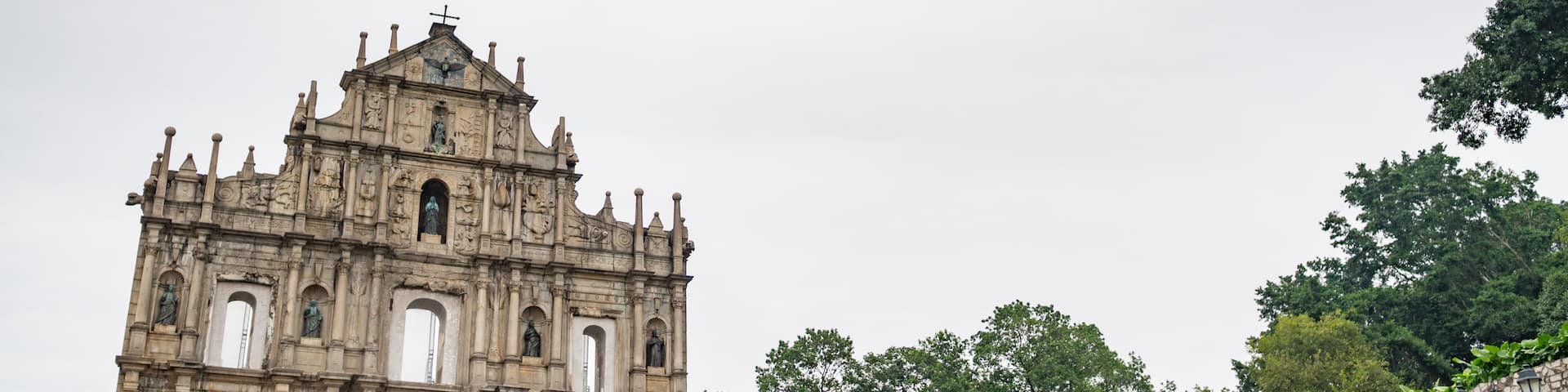 Ruins of St. Paul\'s Cathedral which includes street scenes, heritage elements and a park