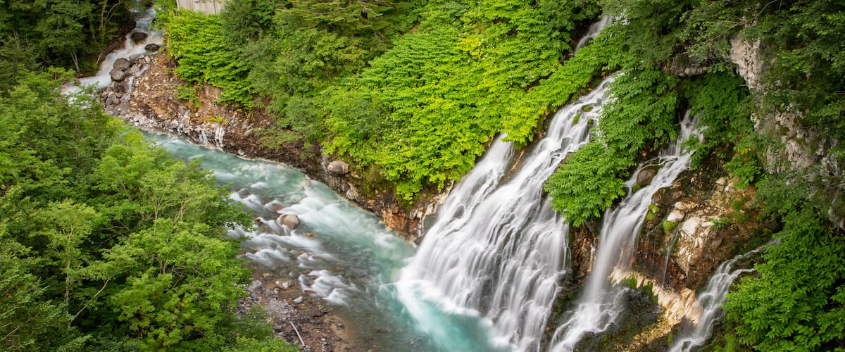 Shirahige Falls which includes rapids, landscape views and a gorge or canyon