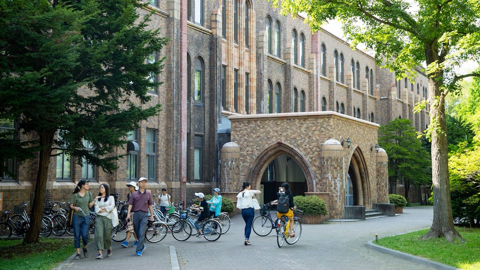 Hokkaido University featuring street scenes and heritage elements as well as a small group of people
