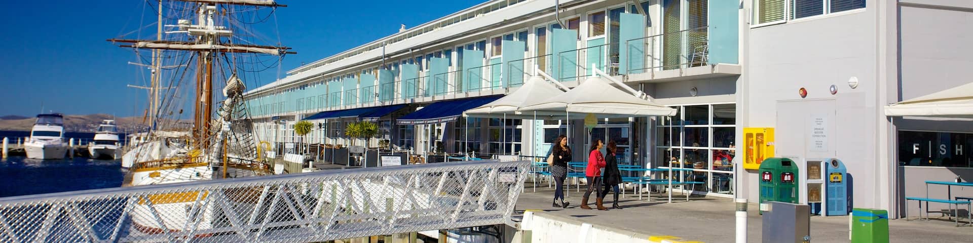 Constitution Dock showing a bay or harbor, sailing and a coastal town