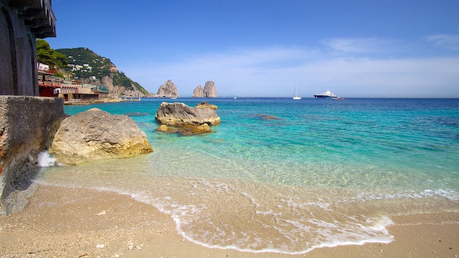 Marina Piccola featuring boating, a beach and rocky coastline