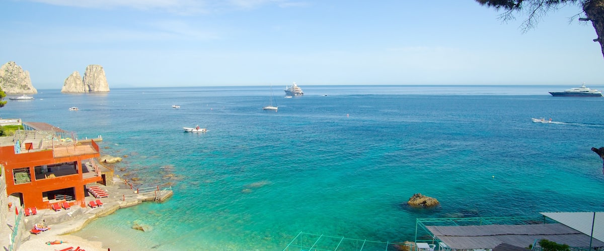Marina Piccola featuring a coastal town, a luxury hotel or resort and a sandy beach