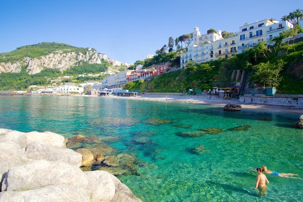Capri which includes rocky coastline, swimming and a coastal town