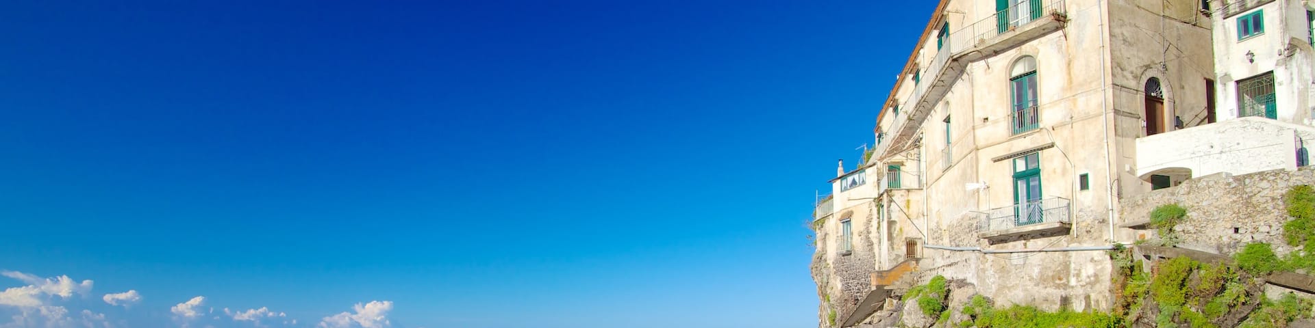 Amalfi Coast featuring rugged coastline and a coastal town