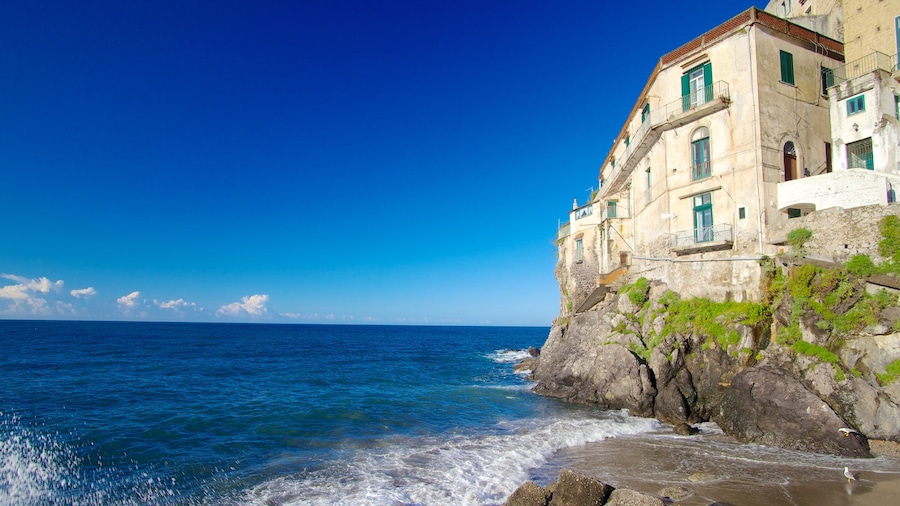 Amalfi Coast showing a coastal town and rocky coastline
