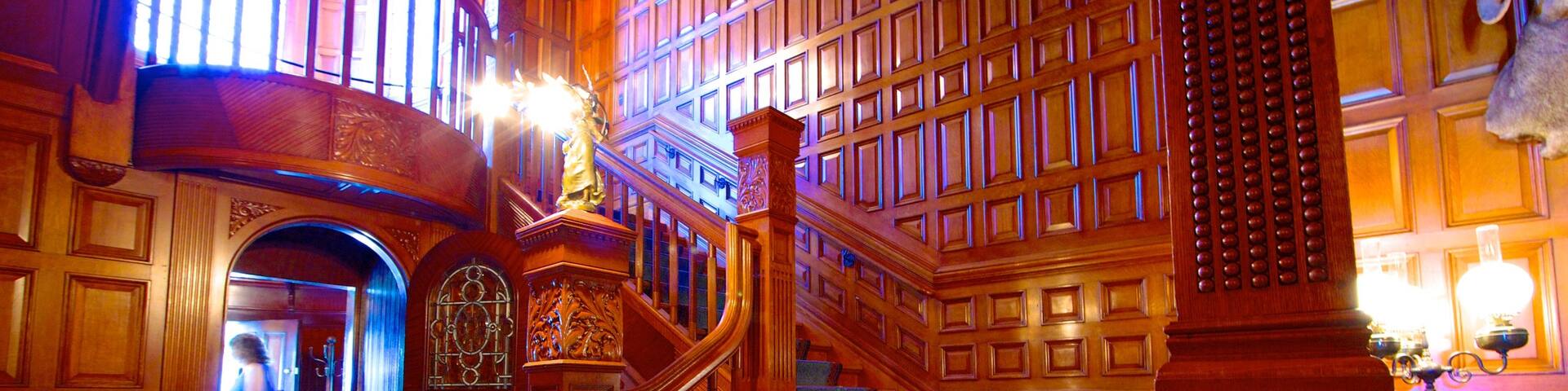 Craigdarroch Castle which includes interior views and heritage architecture