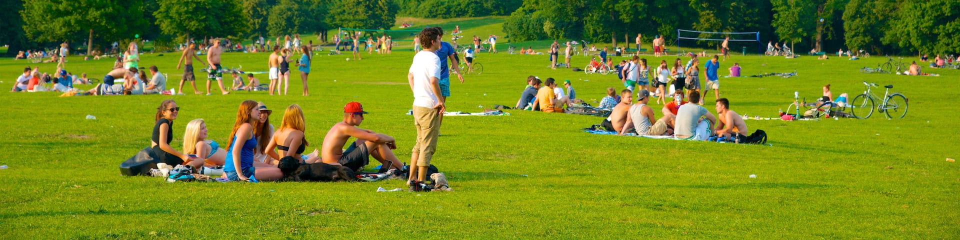 Englischer Garten Süd featuring a park as well as a large group of people