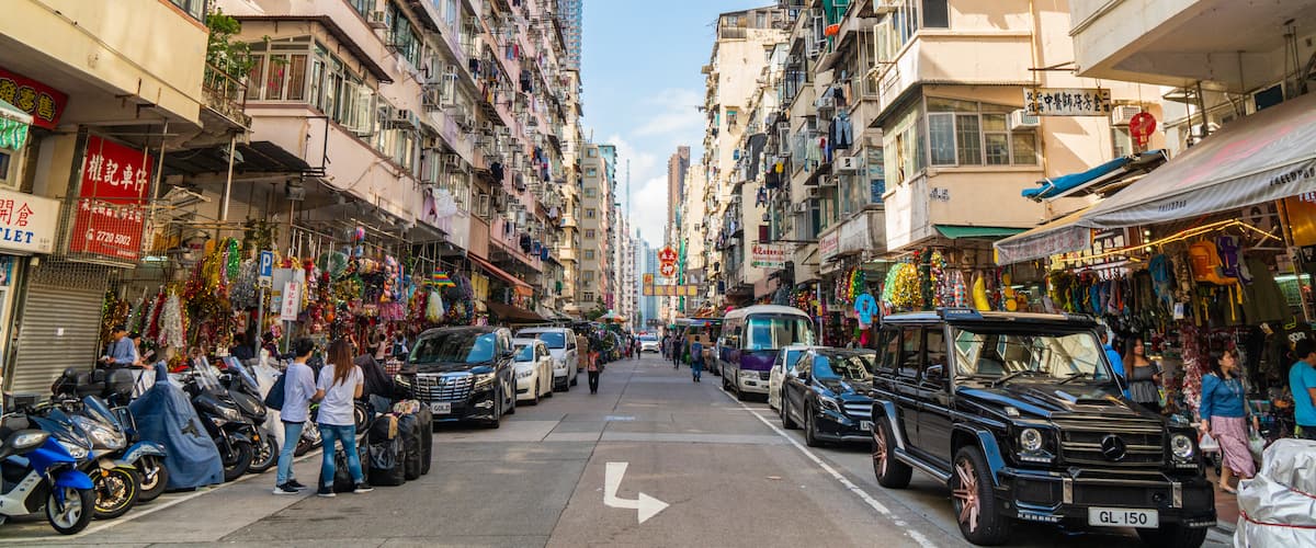 Sham Shui Po which includes street scenes and a city