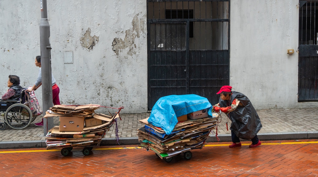 Taikoo showing street scenes as well as an individual child