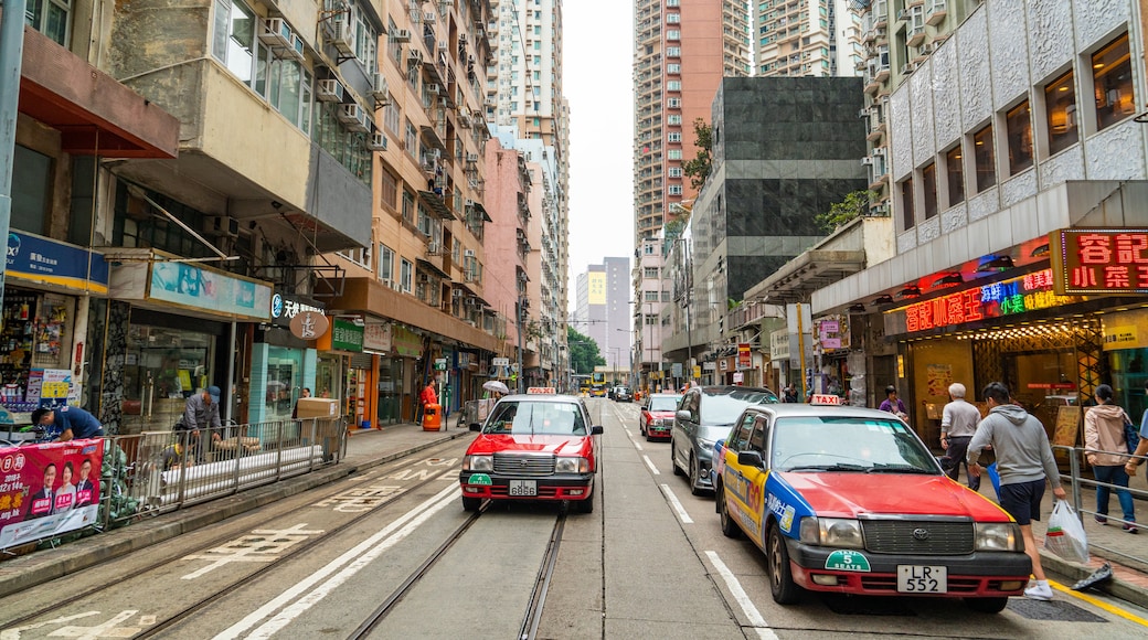 Kennedy Town showing a city and street scenes