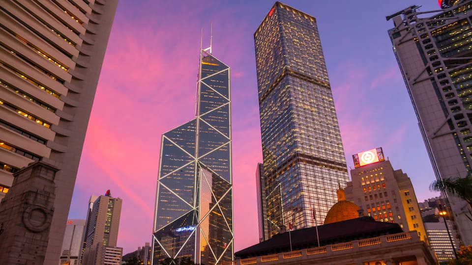 Central showing a skyscraper, a city and a sunset